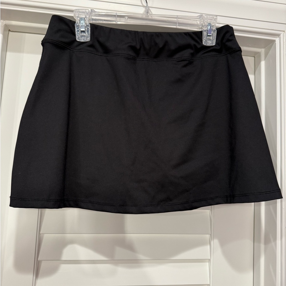 3 Smash Gal tennis skirts - 1 black, 2 white.  Size M, 15” length